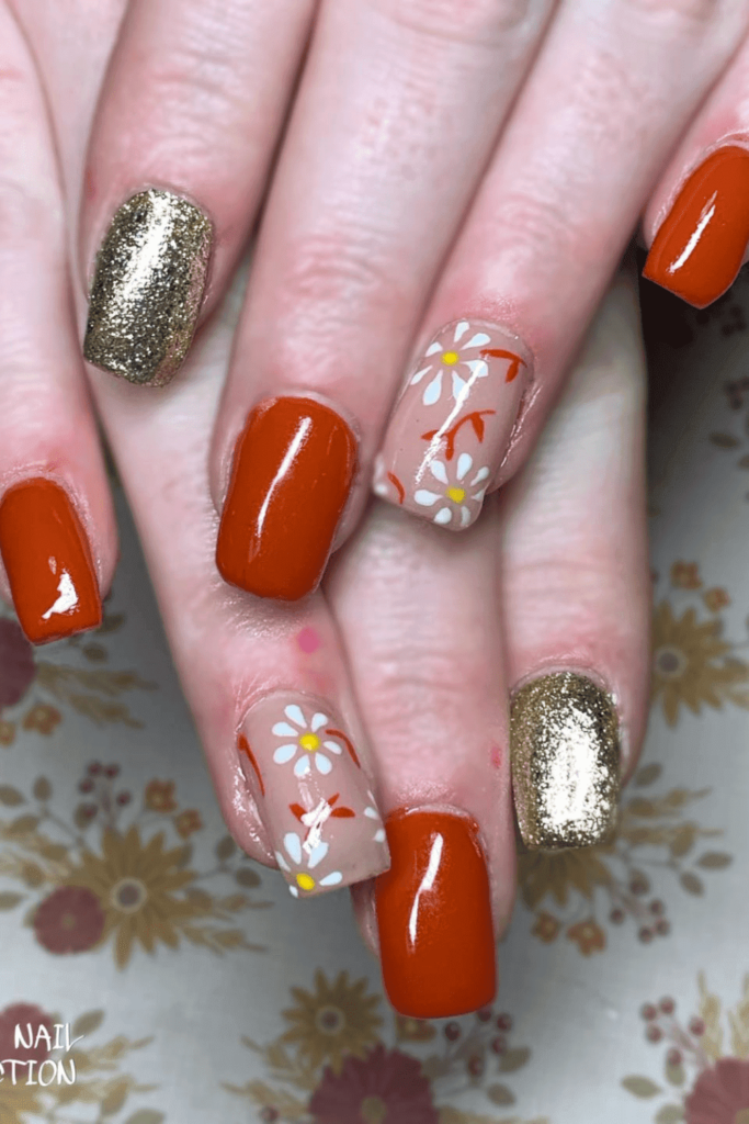 Burnt orange nails with glitter