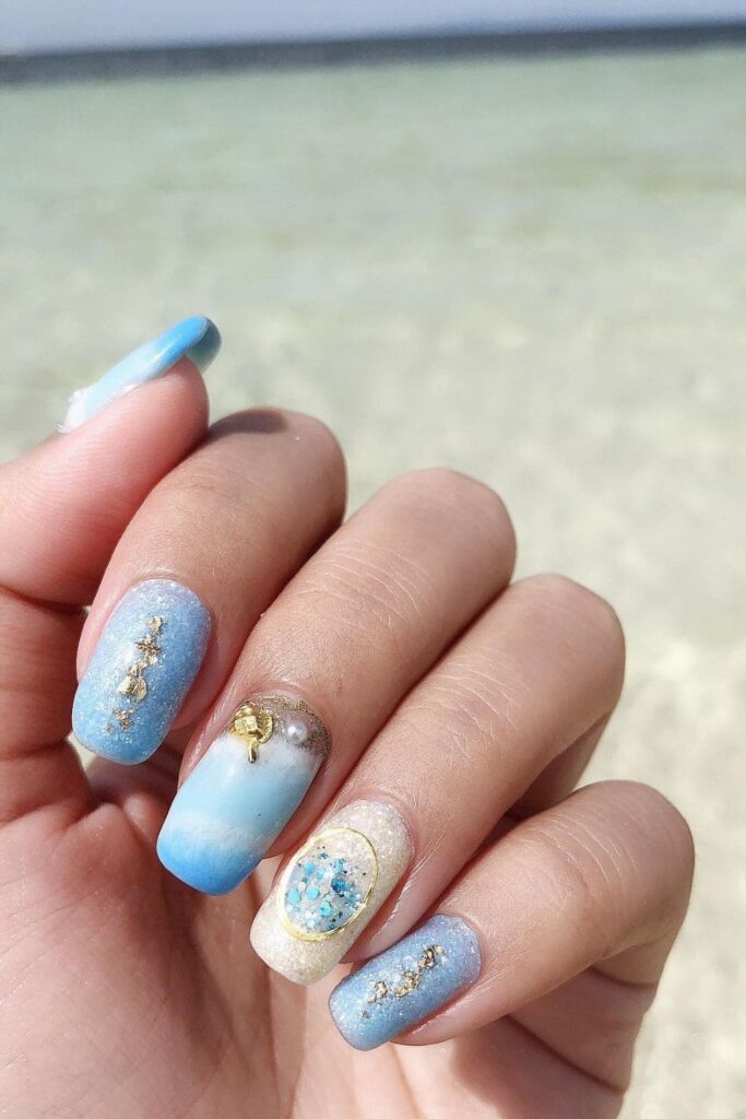Shimmer And Ombre Beach nail design